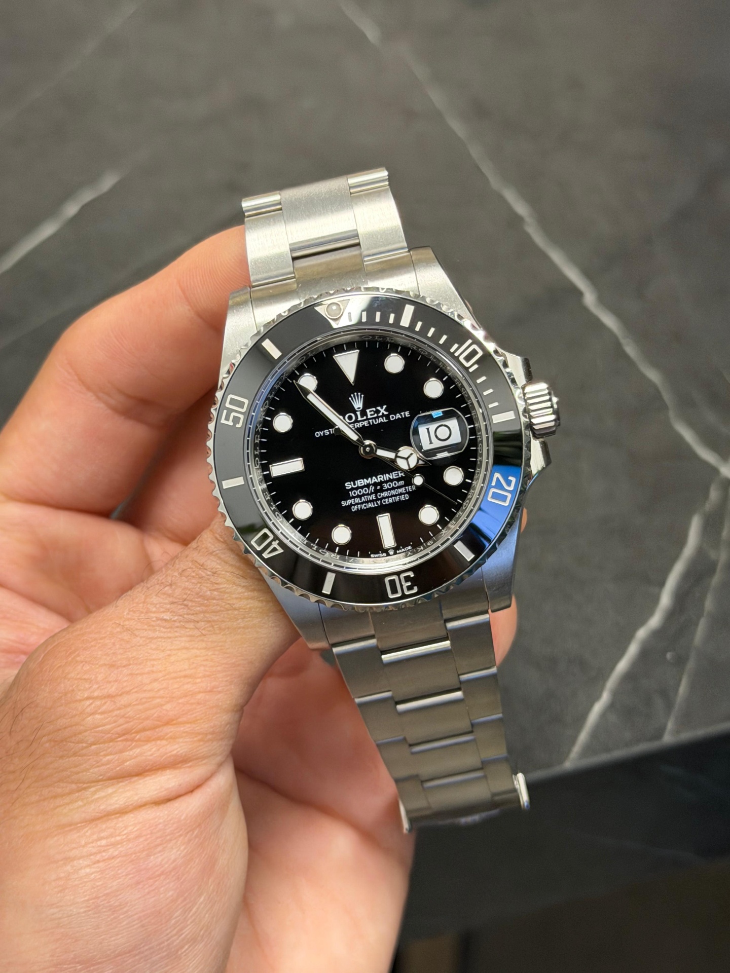 Rolex Submariner black ceramic in hand