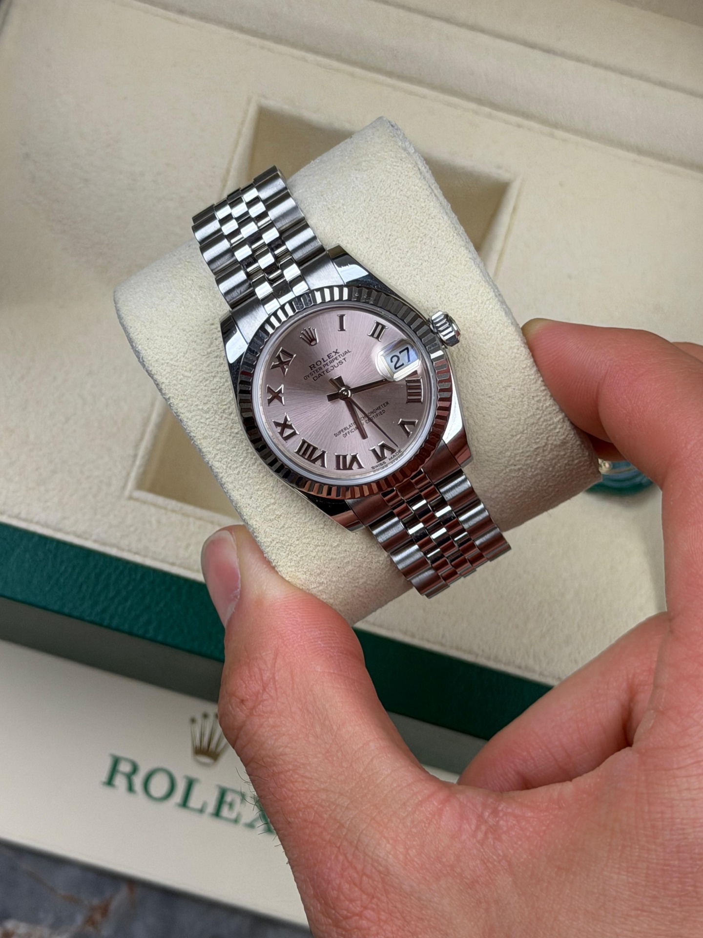 Rolex Datejust 31 pink roman dial in hand